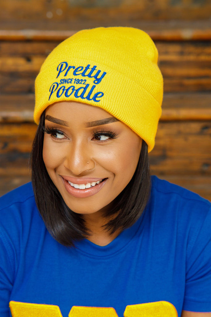 A cute yellow poodle beanie by SGRho Beanies. 