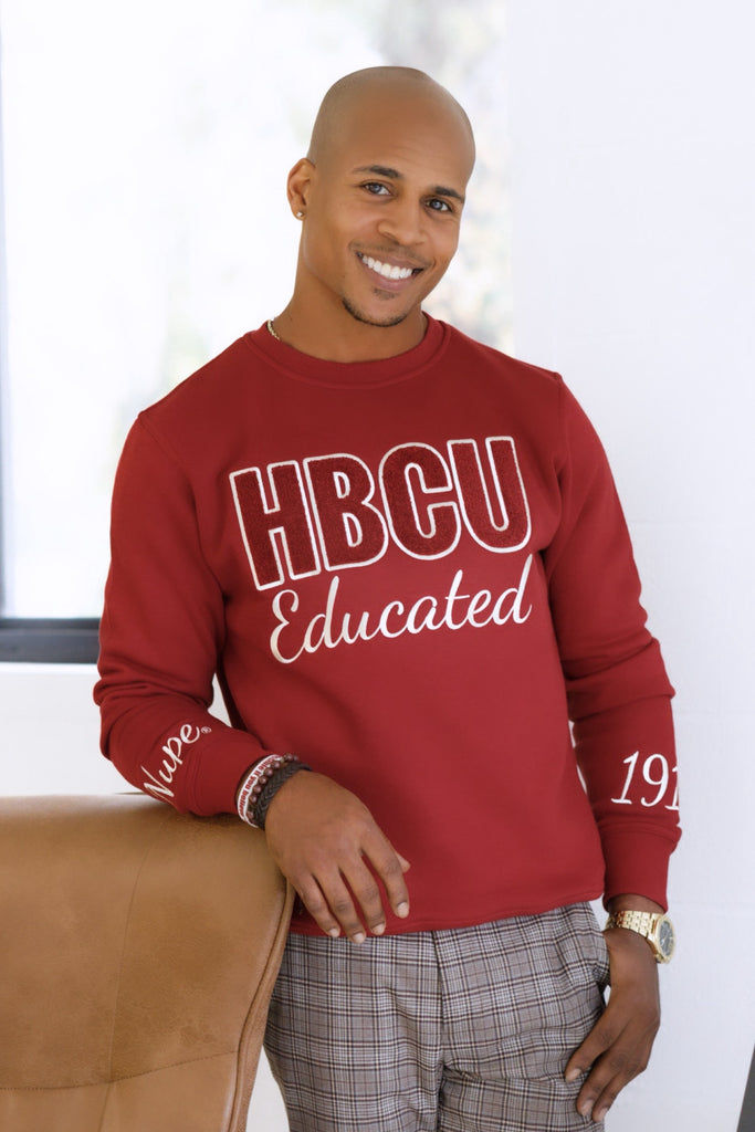 Image of a man wearing the HBCU Nupe Chenille Sweatshirt.