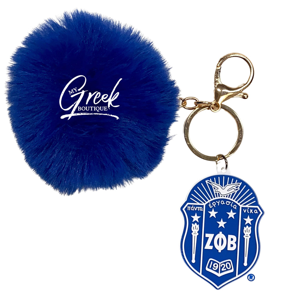 Zeta Phi Kappa keychain with a Zeta Shield adorned with fur, serving as a stylish and unique accessory 